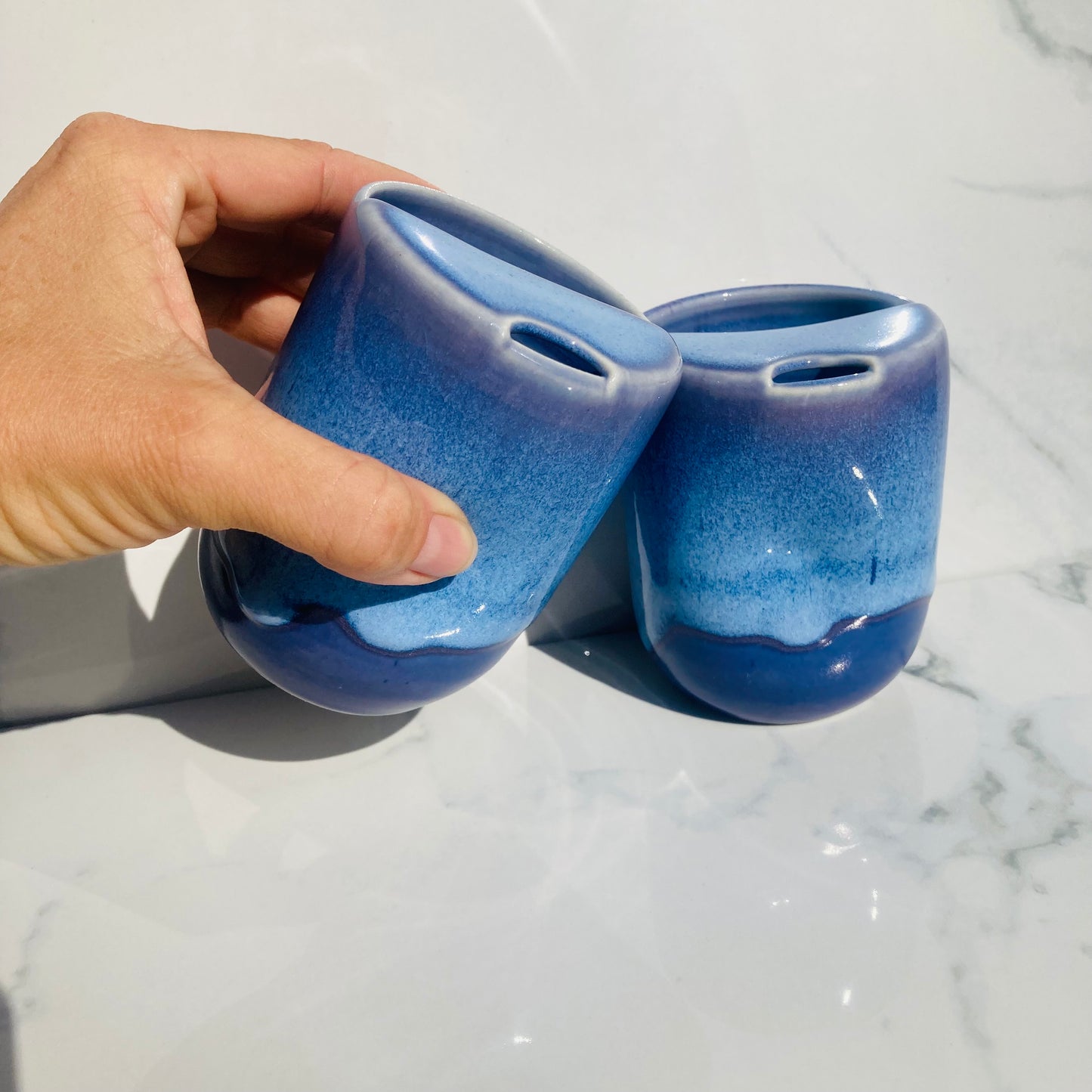 Eco-friendly ceramic coffee travel cup with thumb dimple and car cup holder base