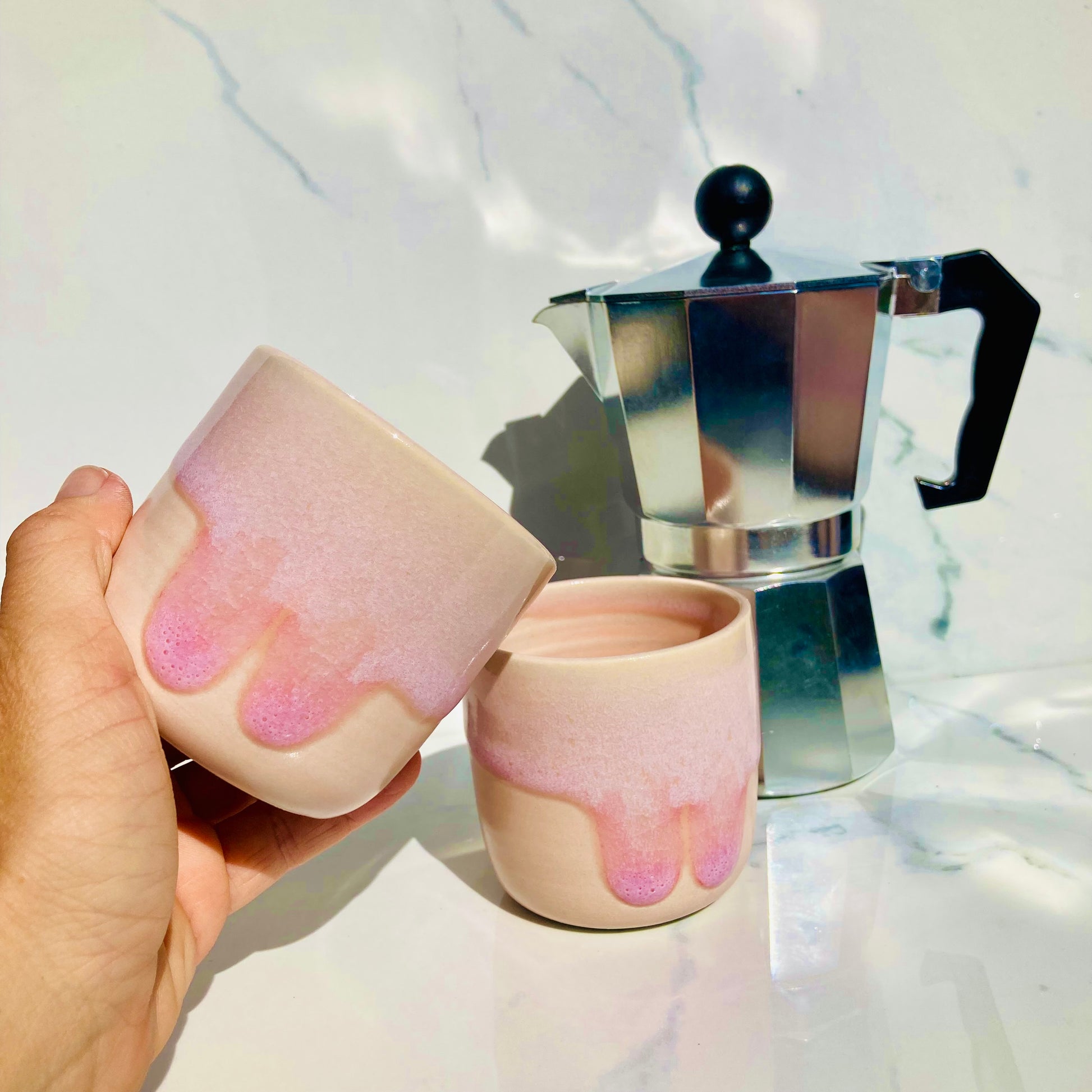 Handmade blush pink ceramic espresso cup with drip glaze