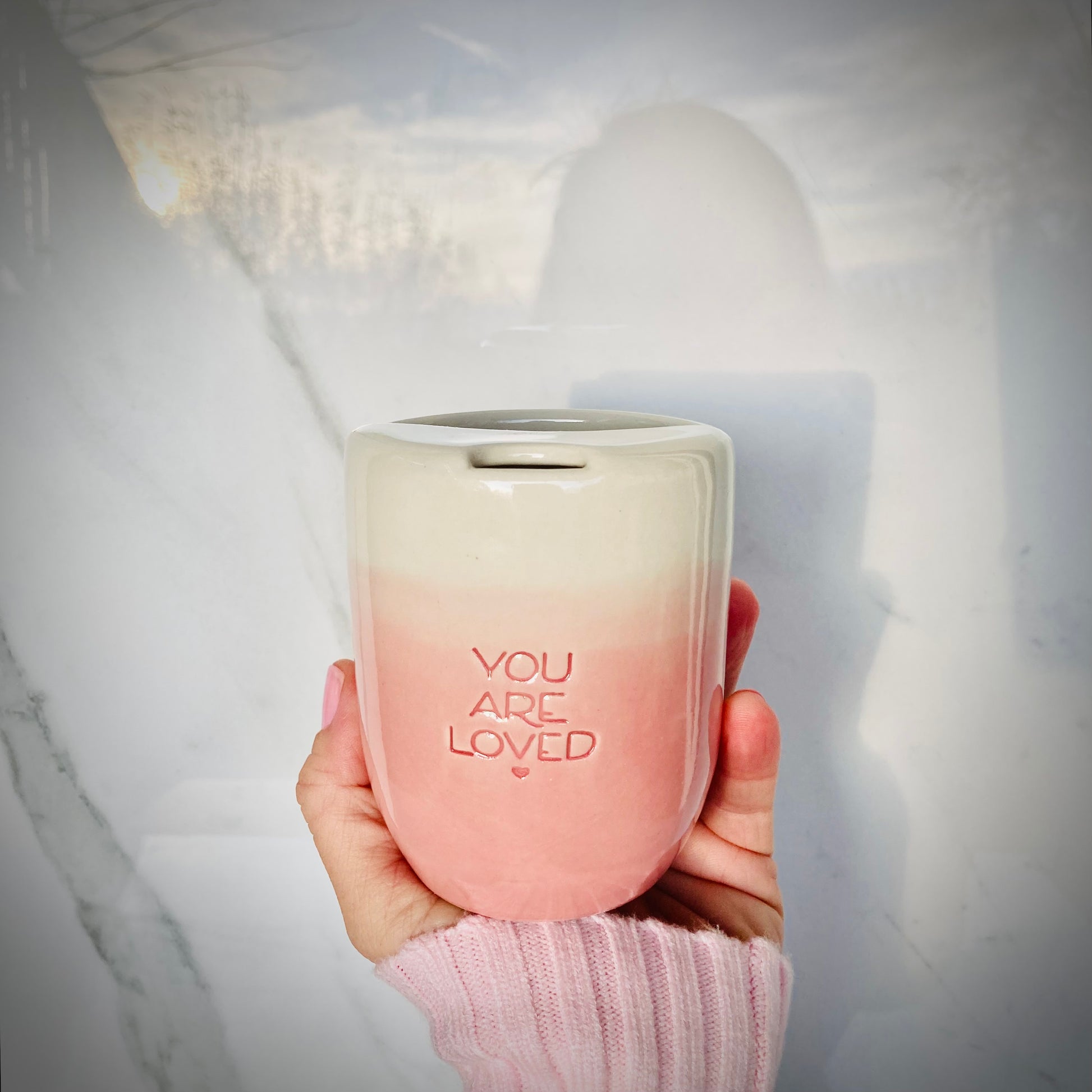 Unique ceramic travel mug in pink 